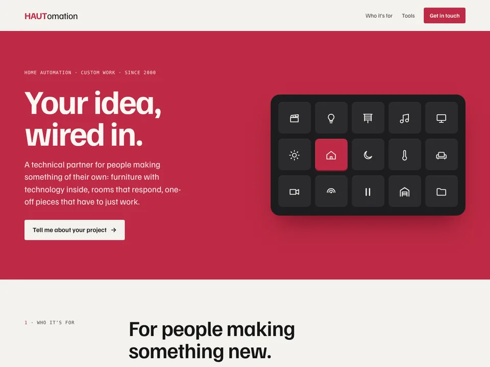 The HAUTomation site: “Your idea, wired in.” in white on rouge, beside a deck of keys